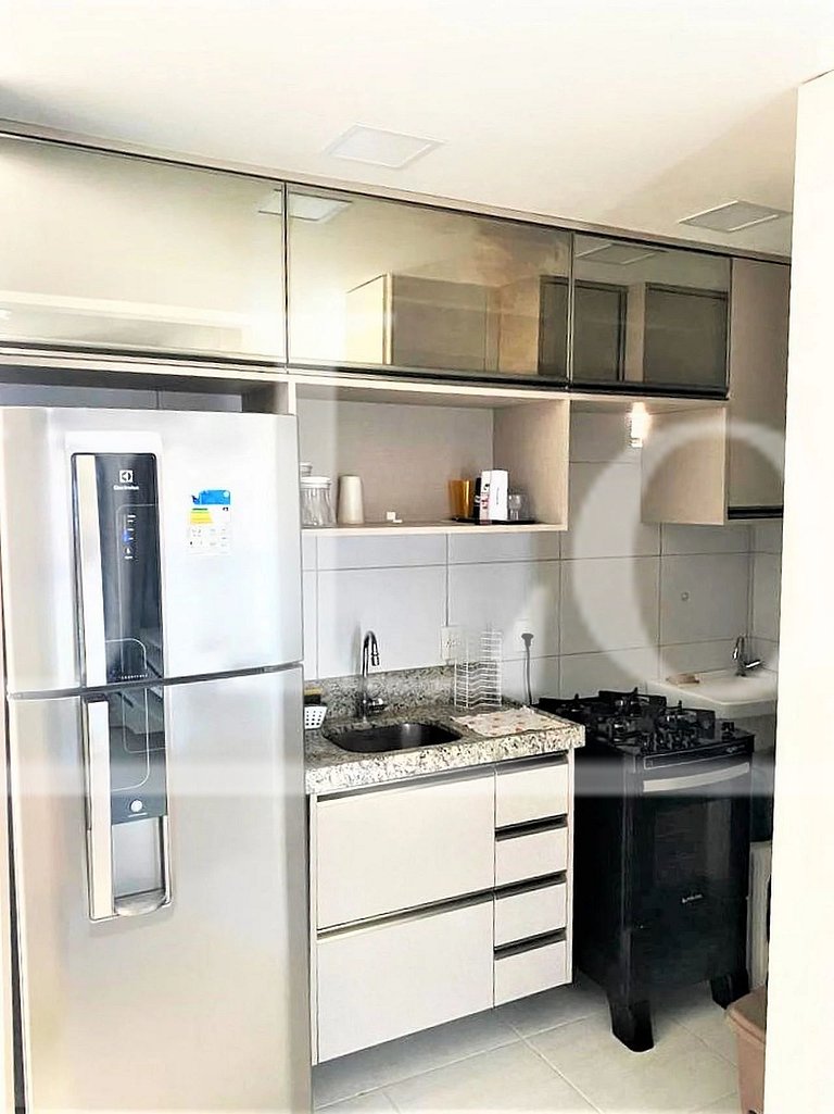 apartamento com suit, sala de estar, banheiro e lavabo